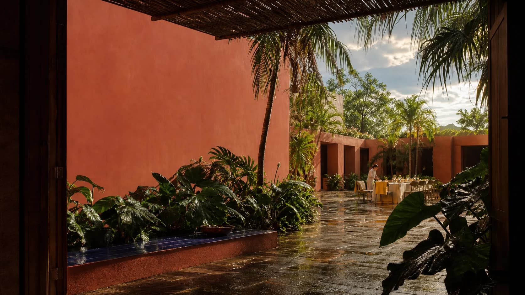 Dinner being prepared in a rain-cleared courtyard